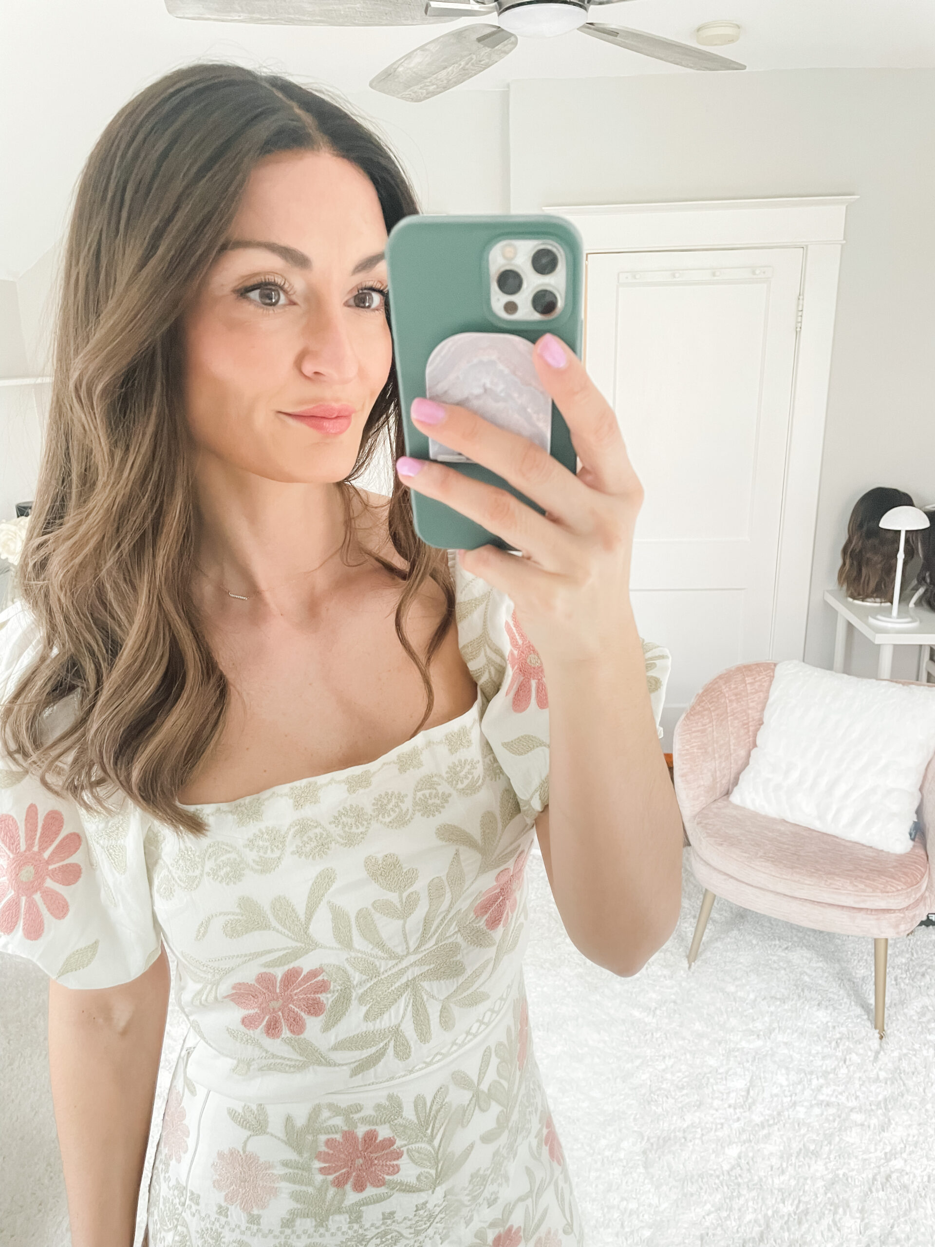 woman wearing a wig smiling and confident