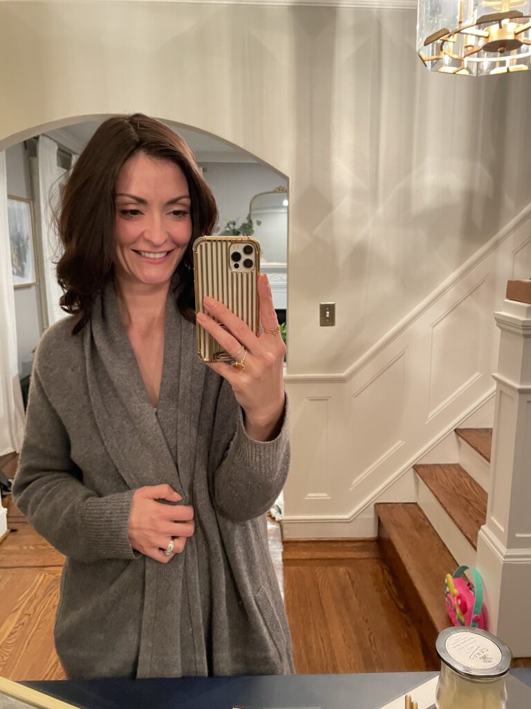 woman wearing a wig smiling