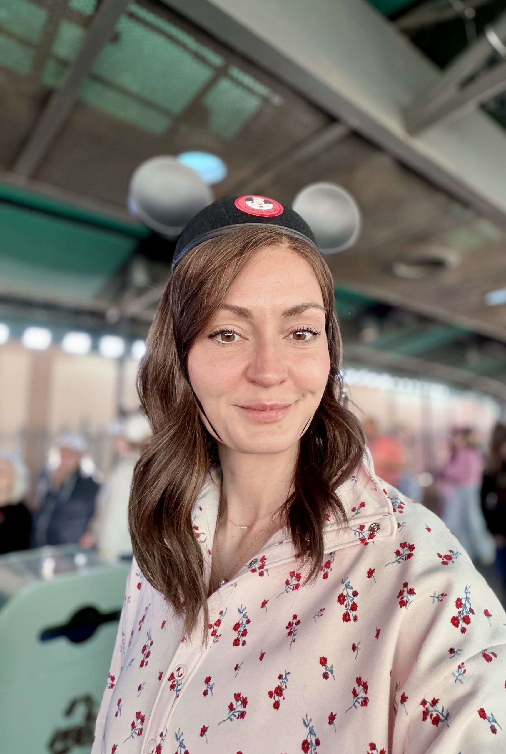 woman wearing wig with Mickey Mouse ears